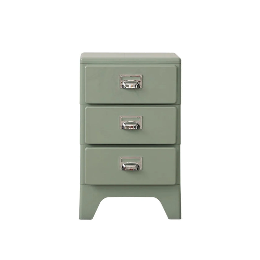 Green nightstand with three drawers on a white background