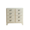 Beige dresser with multiple drawers on a white background