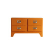 Orange dresser with four drawers on a white background