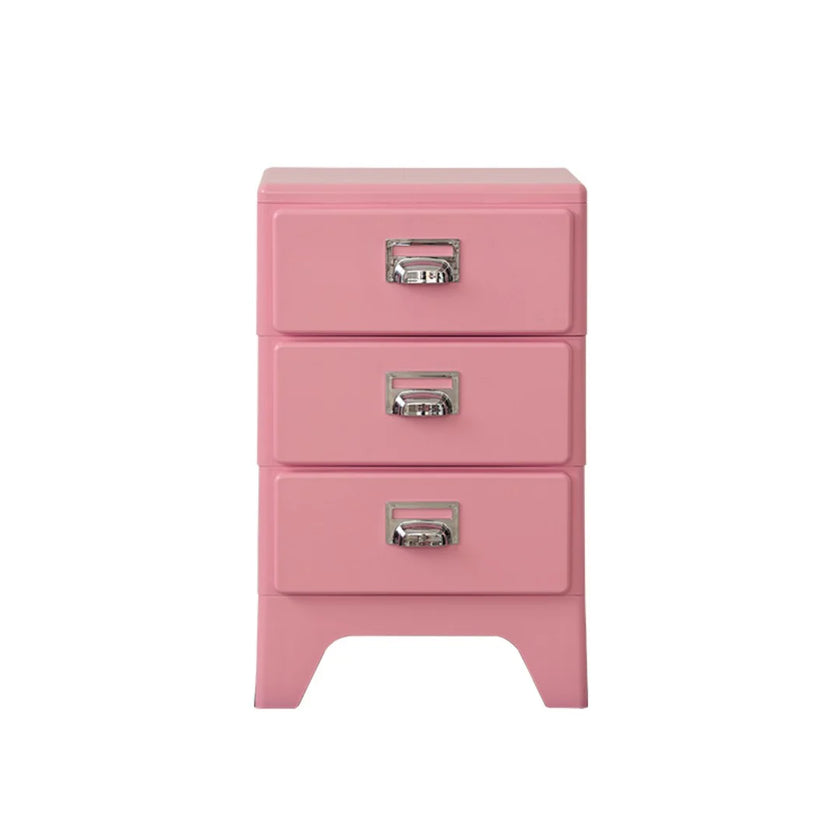 Pink nightstand with three drawers on a white background