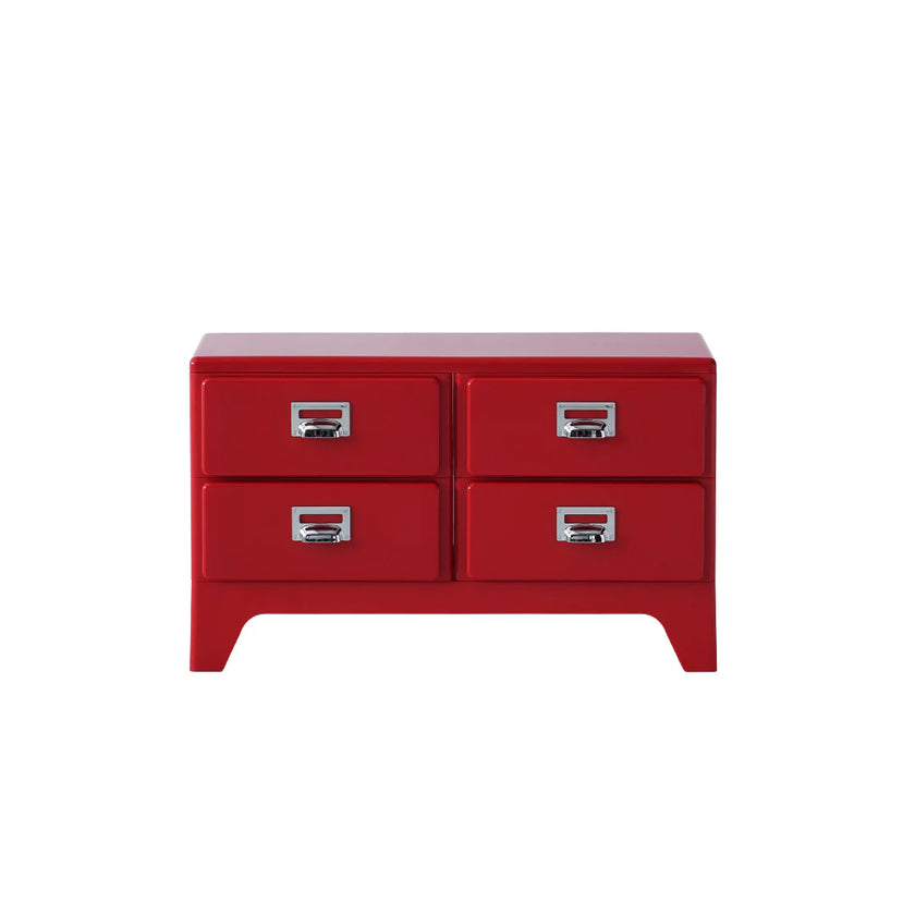 Red dresser with four drawers on a white background