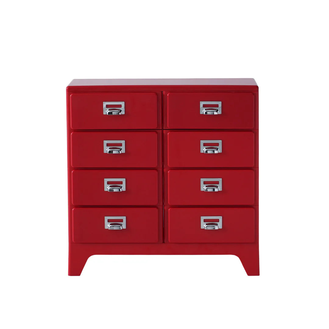Red dresser with multiple drawers on a white background