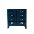 Blue dresser with multiple drawers on a white background