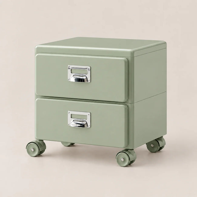 A sage green two-drawer rolling file cabinet with silver metal handles and matching wheels, shown on a solid light beige background.
