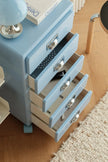 Blue nightstand with multiple drawers on a wooden floor.