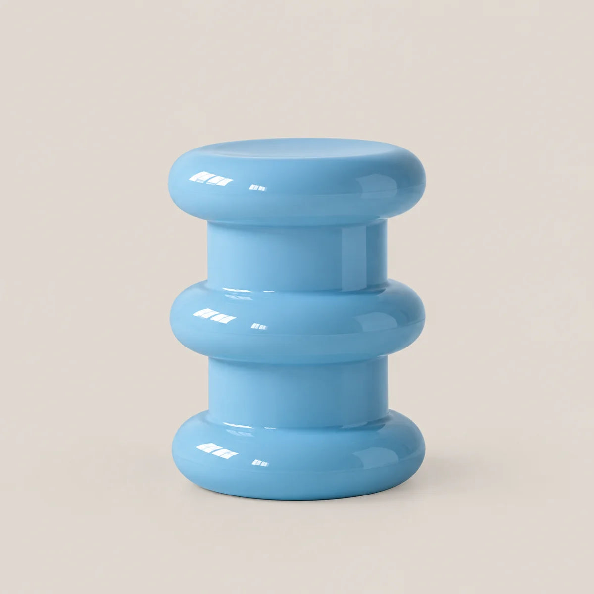 A light blue modern tiered stool with a glossy finish, set against a solid beige background.