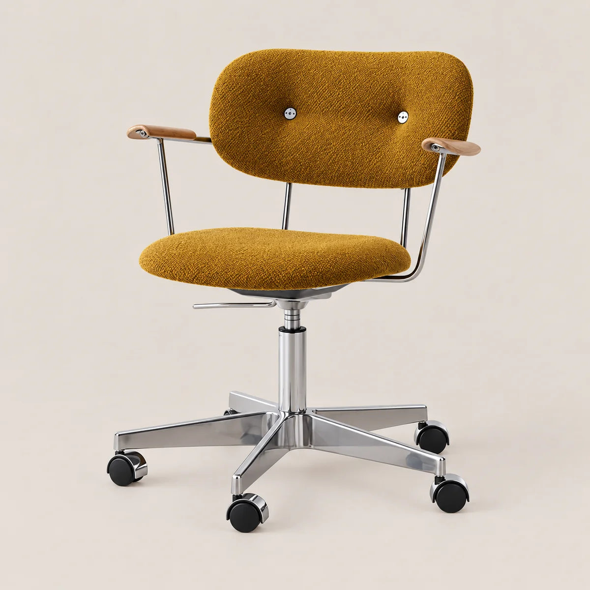 A modern office chair with a mustard yellow bouclé upholstered seat and backrest, featuring light wood armrests, a chrome metal frame, and black caster wheels, set against a solid beige background.