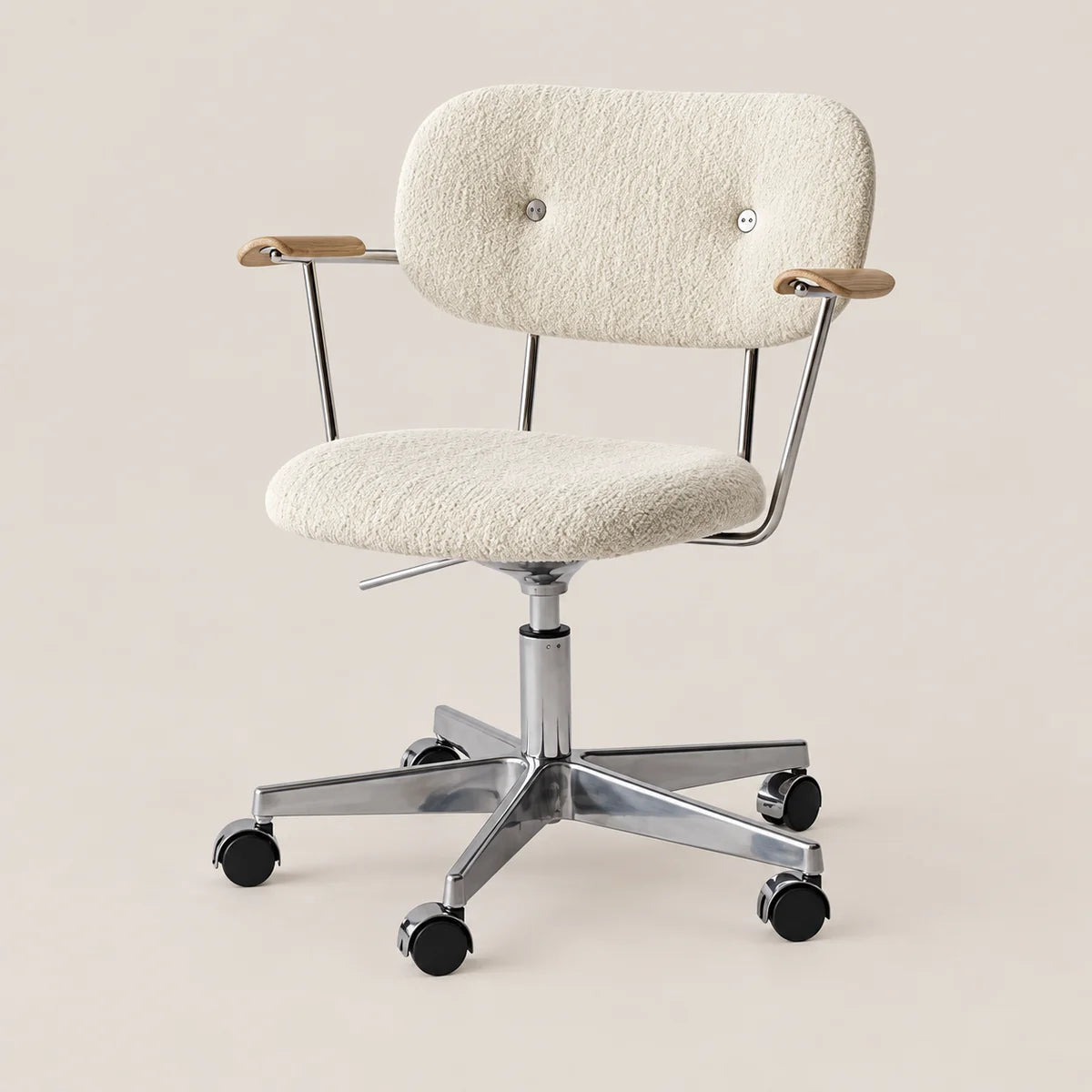An adjustable office chair with a textured cream bouclé upholstered seat and backrest, chrome metal frame and base, and light wood armrest caps, shown on a plain beige background.