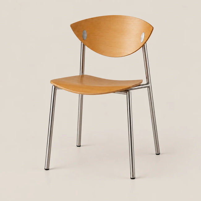 A modern wooden chair with a light natural wood seat and curved backrest, supported by slim silver metal legs, shown against a solid light beige background.