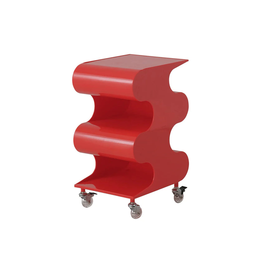Red wavy side table on wheels with a white background