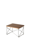 Wooden table with metal frame on a white background