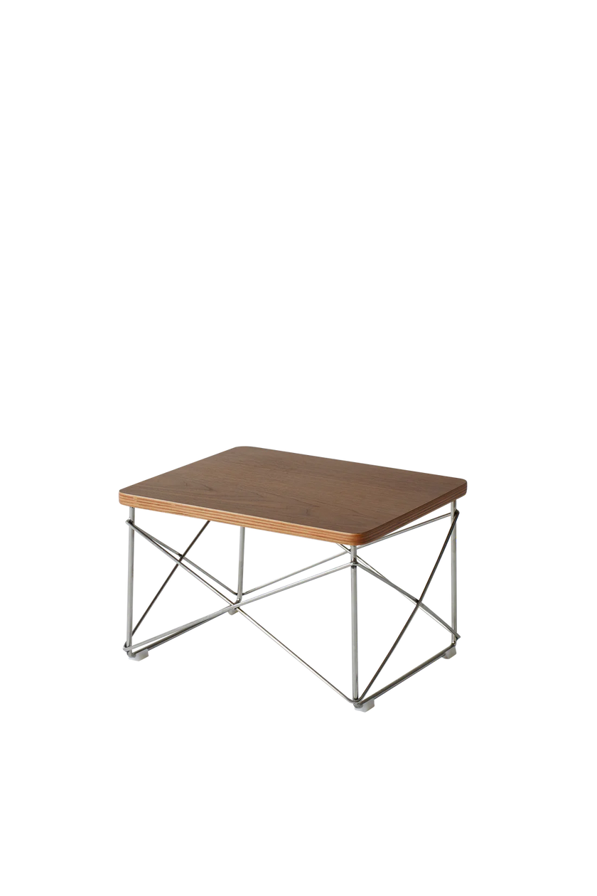 Wooden table with metal frame on a white background