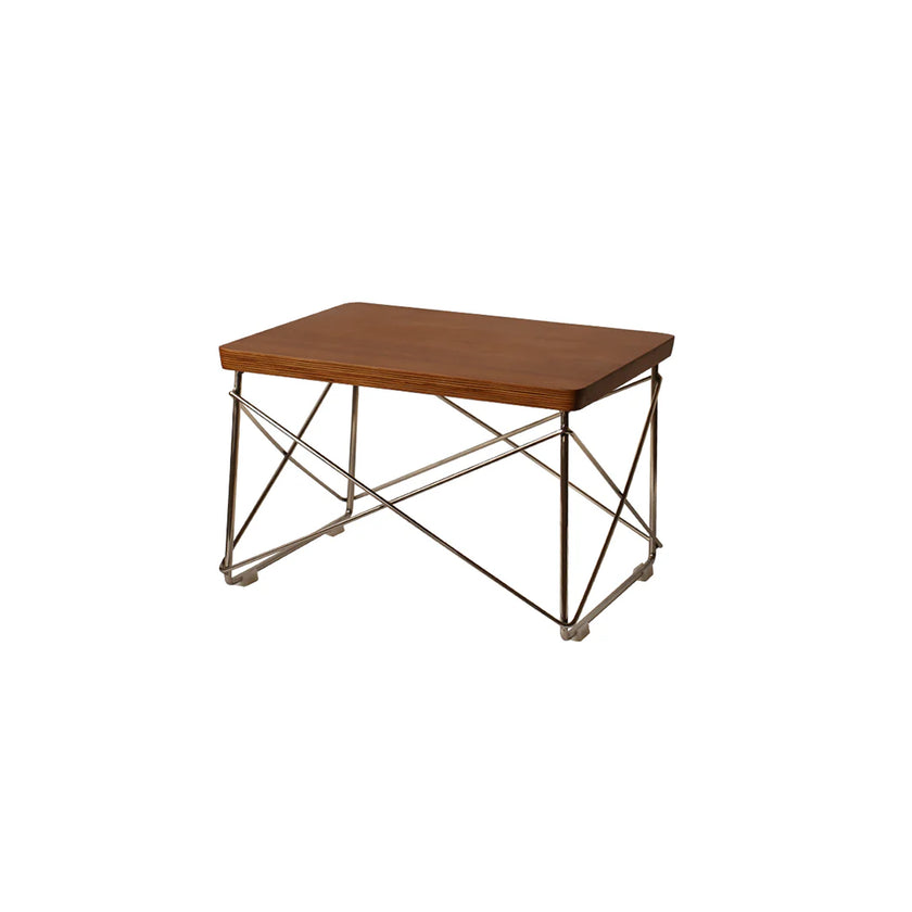 Wooden table with metal frame on a white background