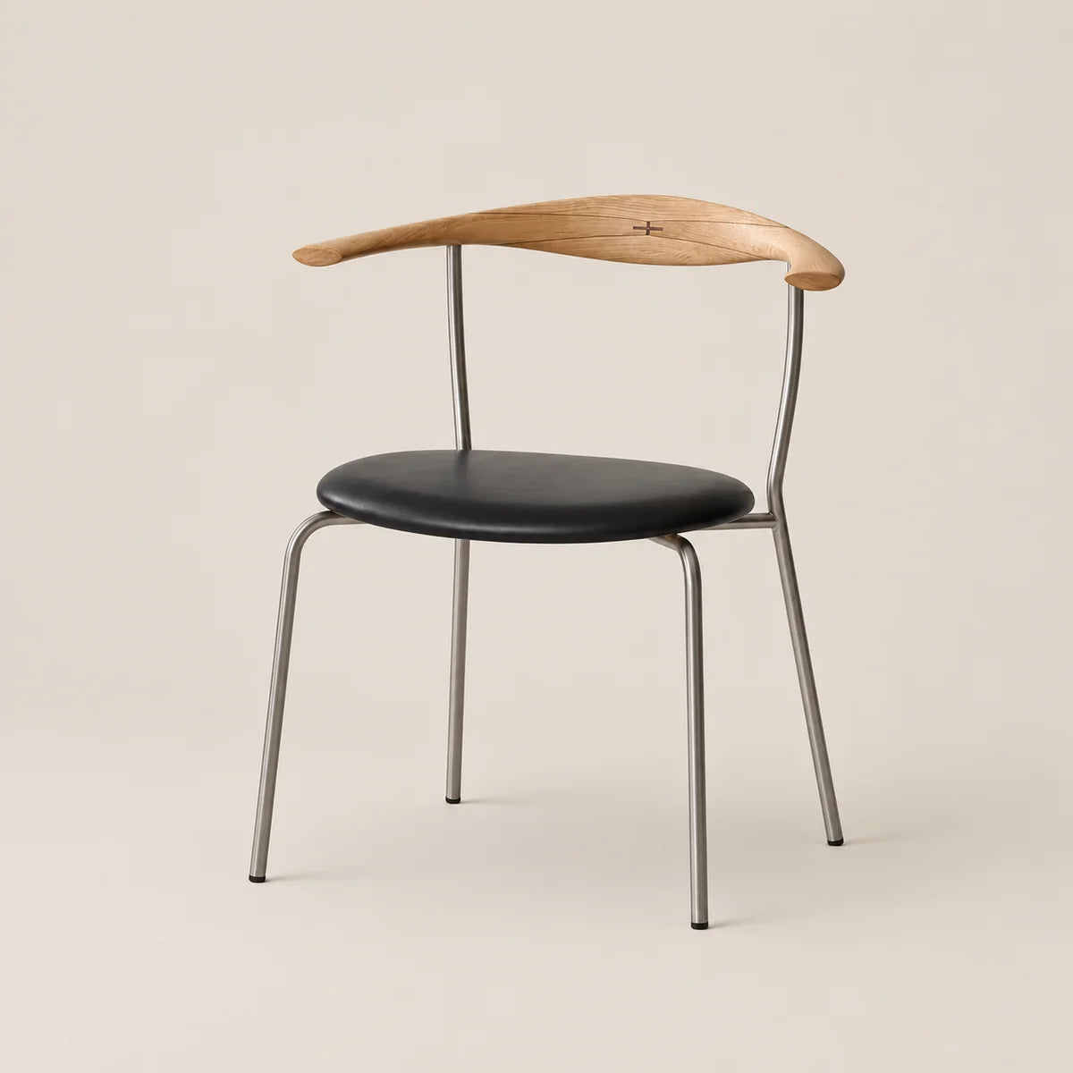 A modern dining chair with a curved natural wood backrest, a black upholstered seat, and slim silver metal legs, shown against a solid light beige background.