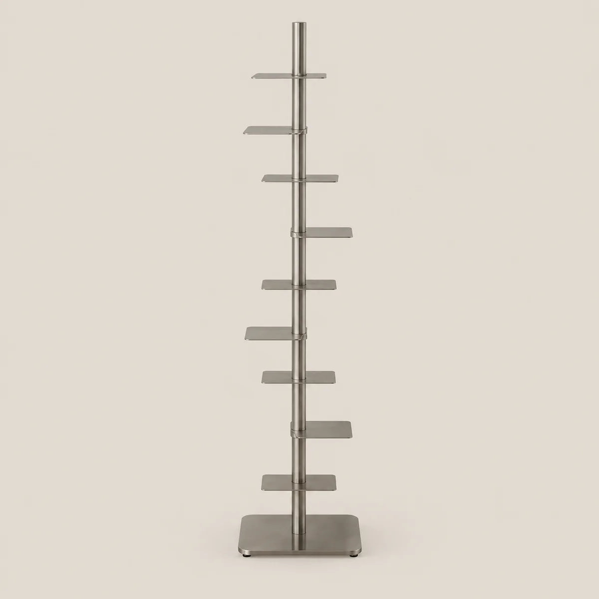 A tall, slim metal display stand with multiple horizontal shelves on a vertical pole, shown against a plain light beige background.