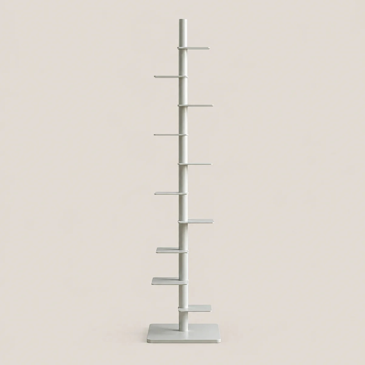 A minimalist, multi-tiered shelving unit or cat tree stand in a light gray finish, featuring a central vertical pole with several horizontal shelves and a square base, set against a solid beige background.