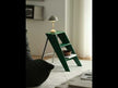An olive-green, three-tier ladder rack that is not only sturdy enough to stand on, but also serves as a display shelf when not in use.