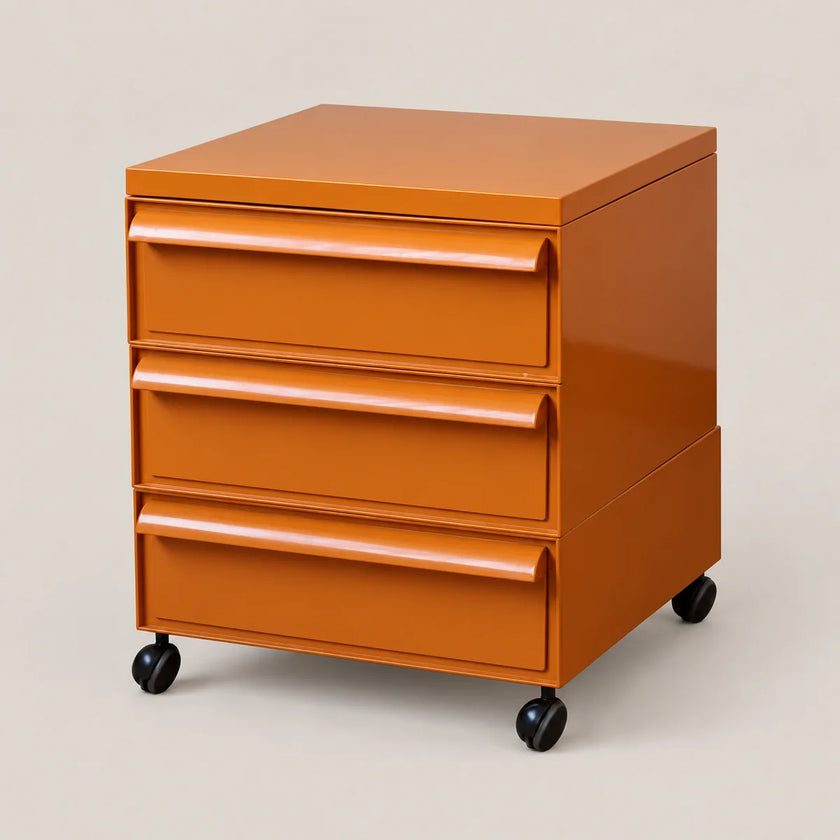 An orange plastic rolling file cabinet with three drawers and black caster wheels, photographed on a solid light beige background.