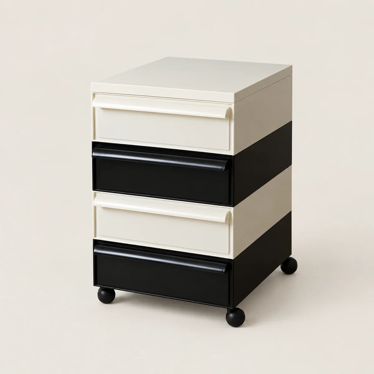 A four-drawer rolling storage cabinet with a modern color-blocked design. The cabinet features alternating cream and black drawer fronts and side panels, with a cream top surface and black caster wheels at the base, photographed against a solid light beige background.