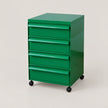 A green 5-drawer rolling storage cabinet with black caster wheels, photographed on a clean, light beige studio background.