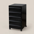 A black 5-drawer rolling file cabinet with a glossy finish and casters, shown on a solid beige background.