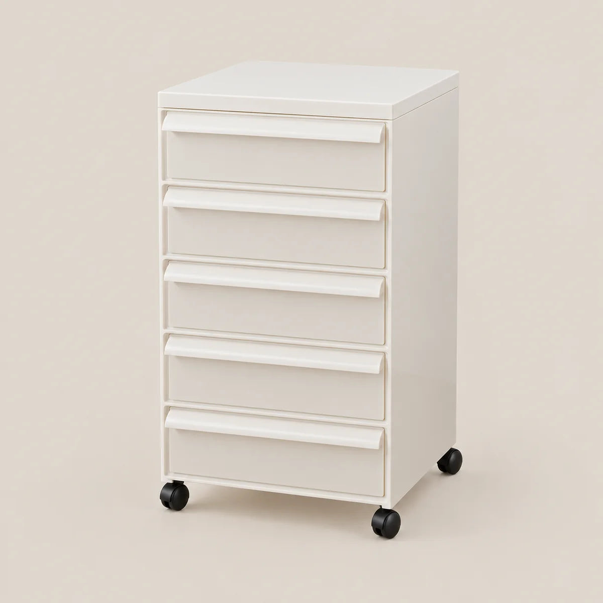 A white 5-drawer rolling storage cabinet with black caster wheels, shown on a solid beige background.