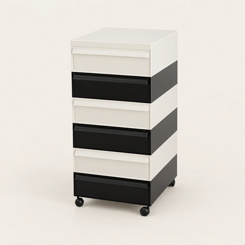 A 6-drawer rolling storage cabinet with a modern striped design in white and black, featuring a white top surface and black caster wheels, shown on a light beige studio background.