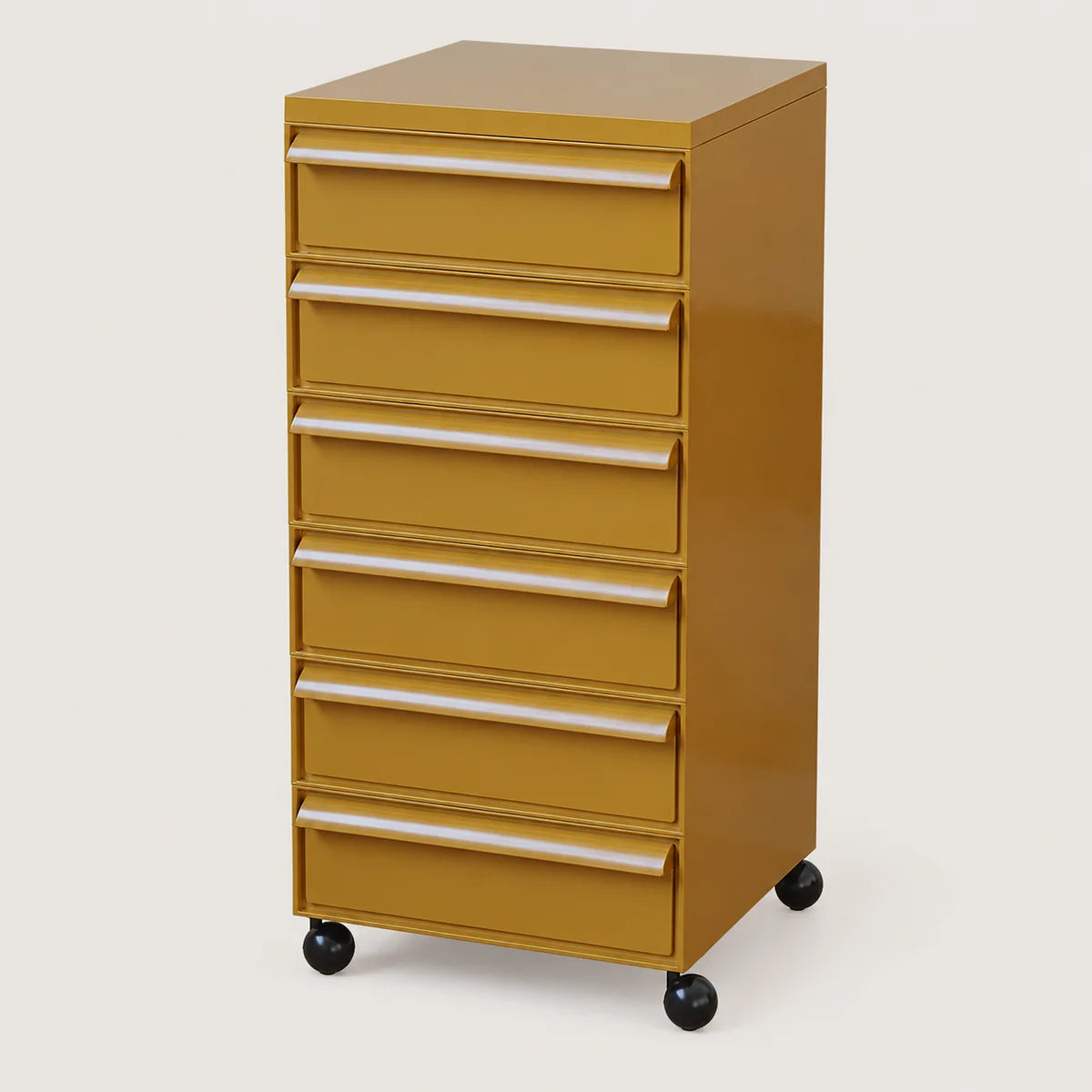 A six-drawer rolling file cabinet in a warm mustard yellow finish with silver metal drawer pulls and black caster wheels, shown on a plain light beige studio background.