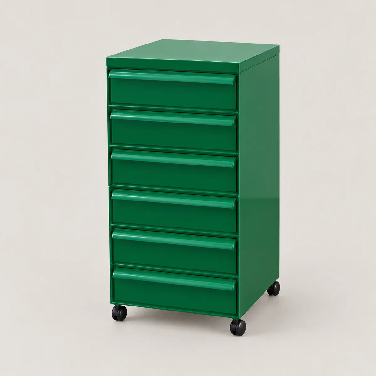 A green 6-drawer rolling tool cabinet with black caster wheels, shown on a light beige studio background.