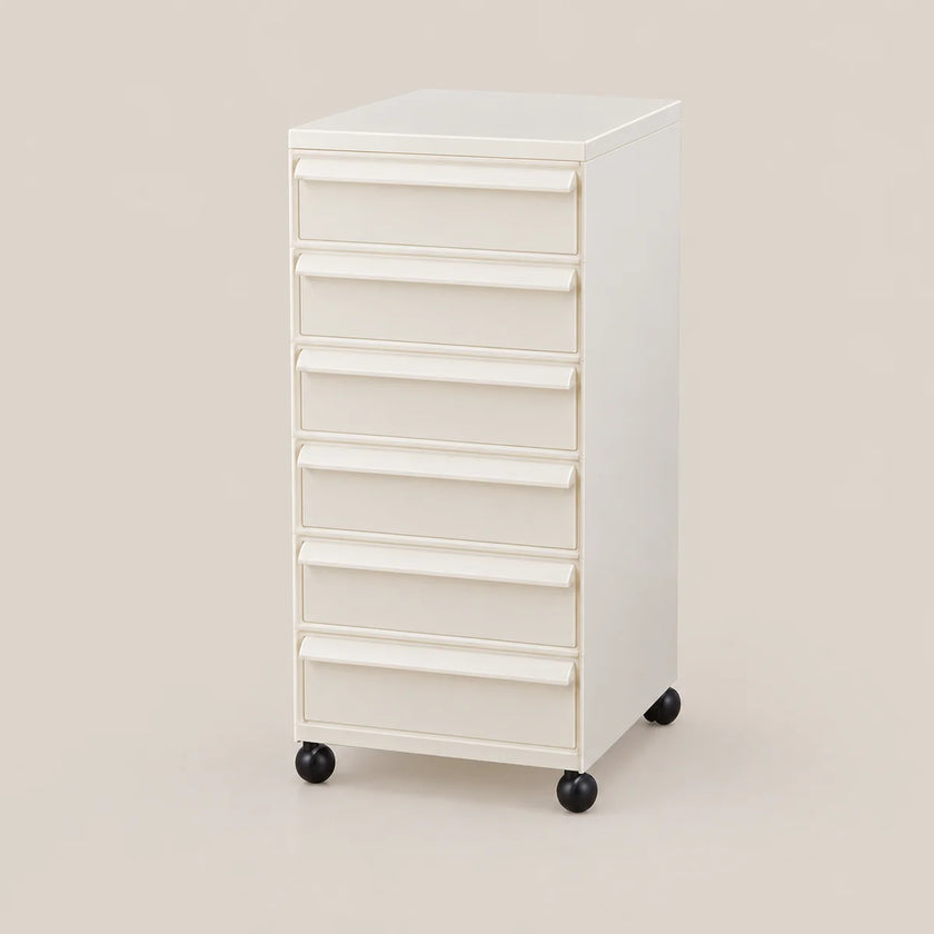 An off-white rolling storage cabinet with eight drawers and black caster wheels, shown on a solid beige background.