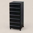 A black six-drawer rolling file cabinet with a glossy finish and caster wheels, shown on a solid light beige background.