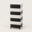 A 7-drawer rolling storage cabinet with a modern striped design in black and white, featuring black drawer fronts and white side panels, on a light gray background.