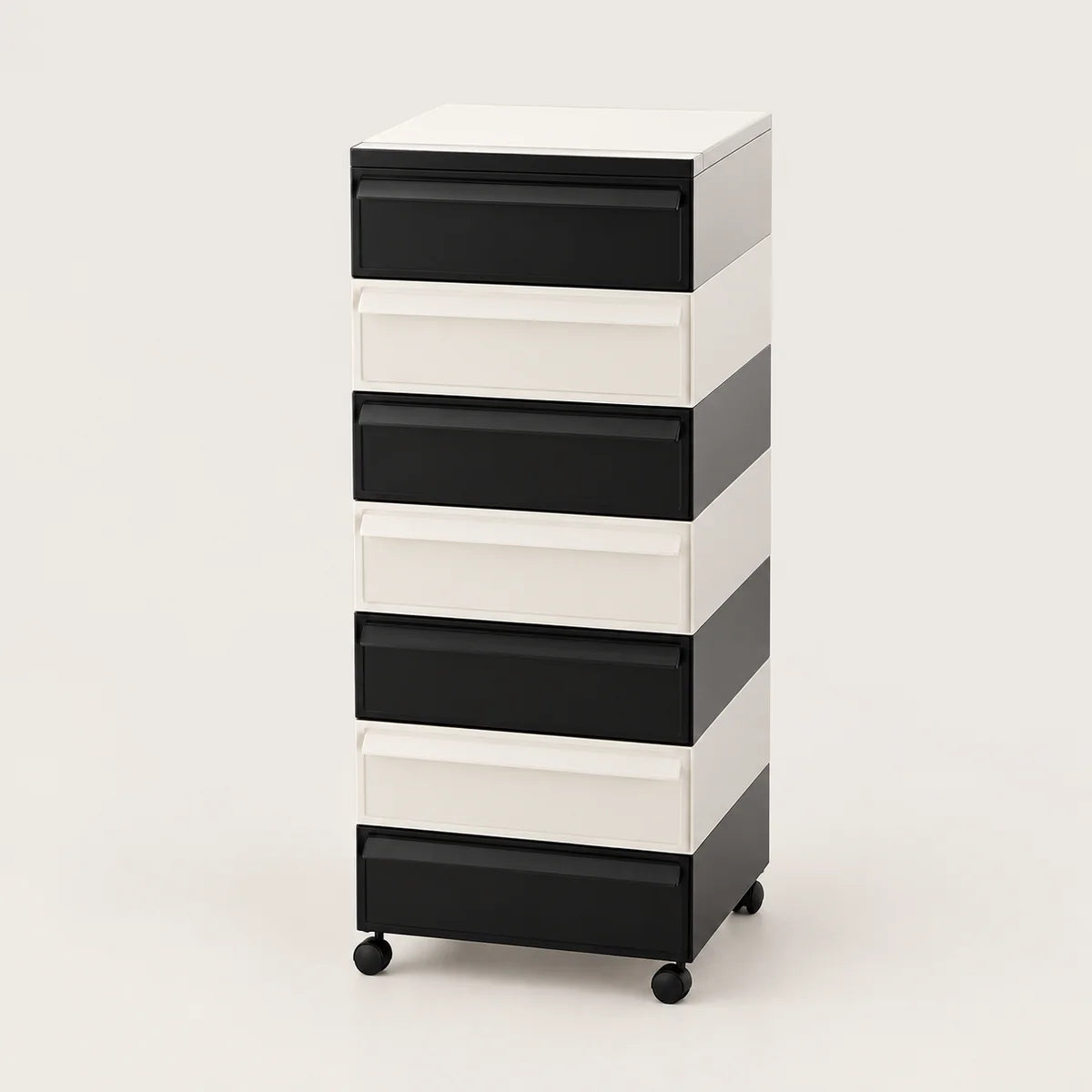 A 7-drawer rolling storage cabinet with a modern striped design in black and white, featuring black drawer fronts and white side panels, on a light gray background.