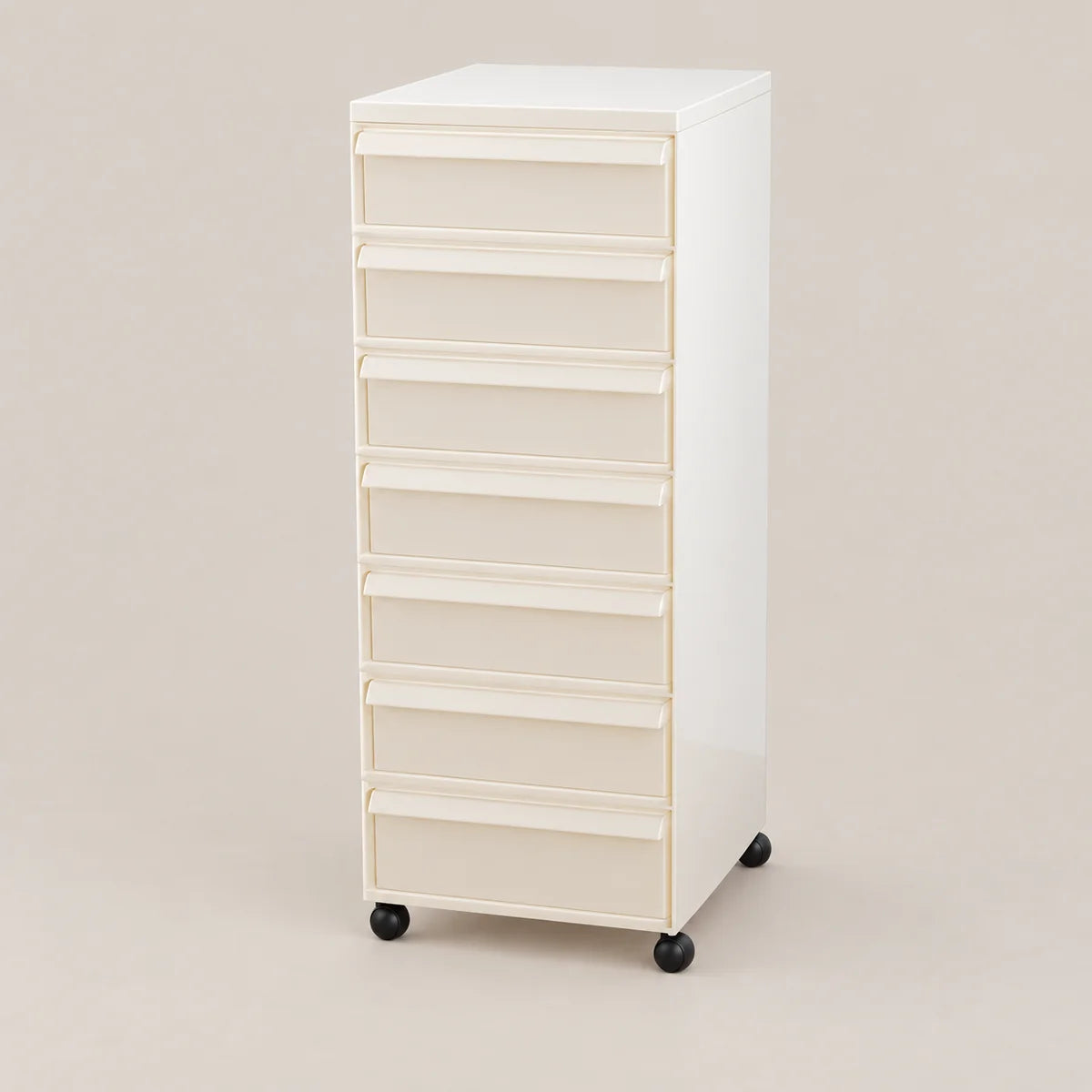 A tall, narrow white rolling storage cabinet with eight drawers and black caster wheels, photographed against a plain warm beige studio background.