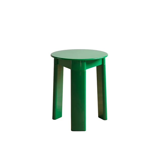 Green round table on a white background