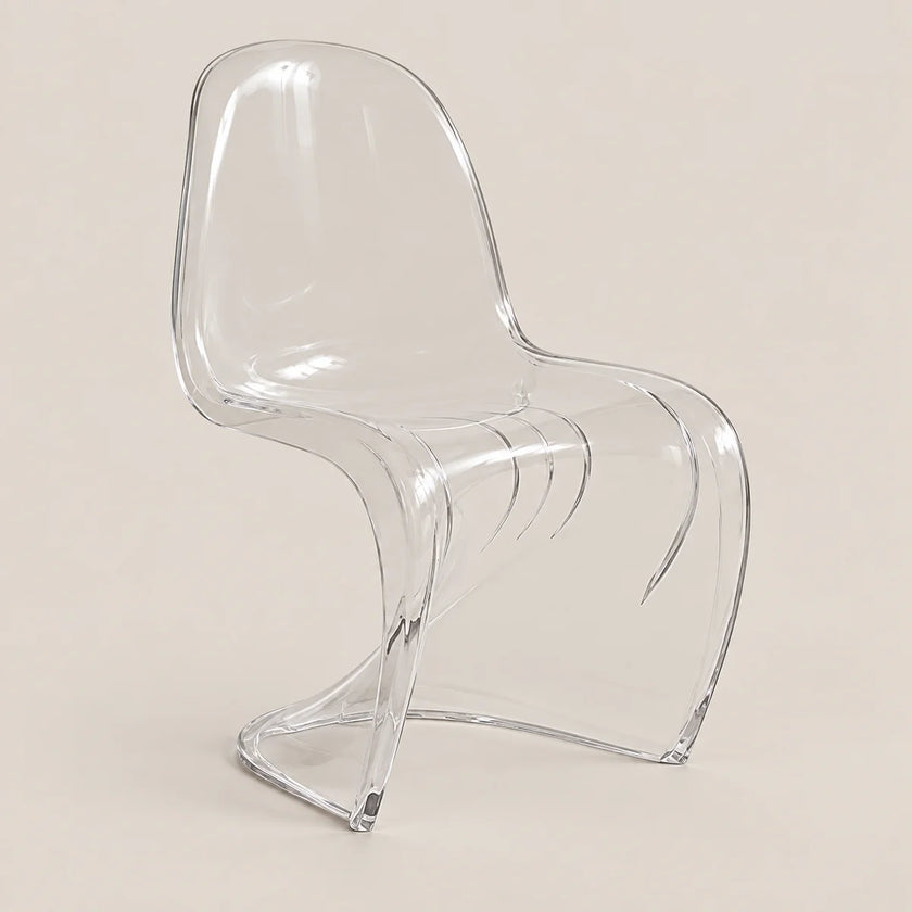 A modern transparent acrylic dining chair with a curved sculptural design, shown on a solid light beige background.