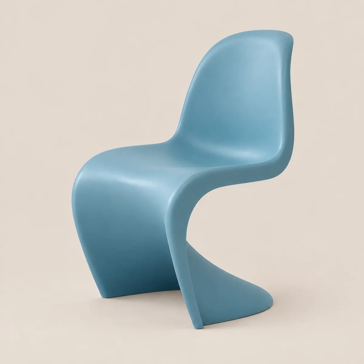A modern sculptural chair in a matte light blue color, photographed against a solid, warm beige background.