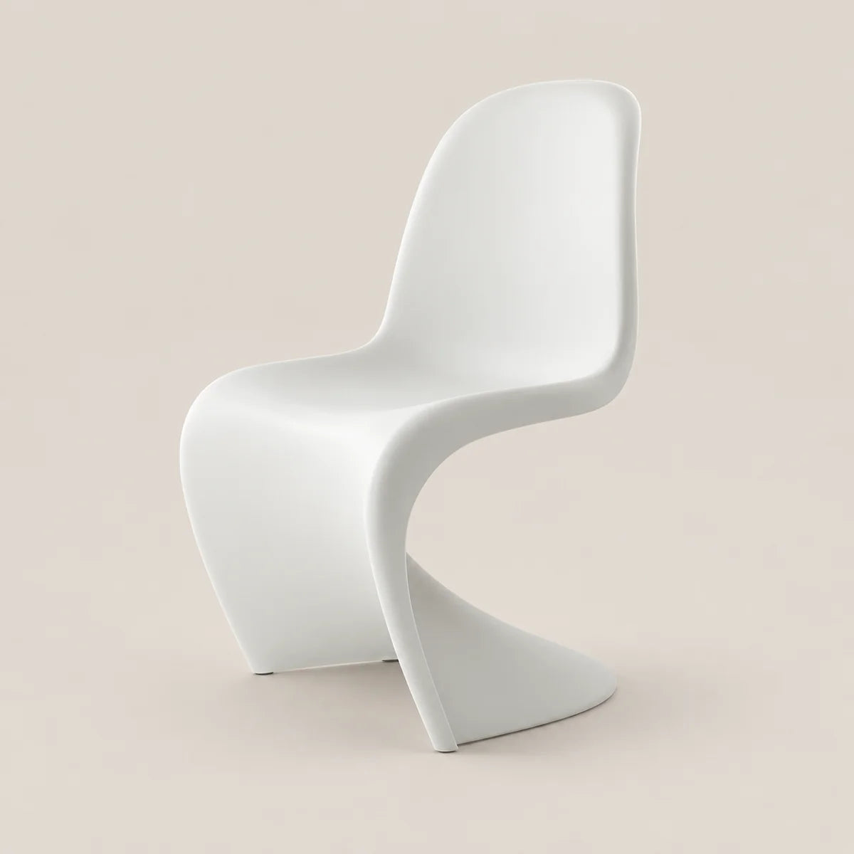 A modern white molded plastic chair with a curved, sculptural design, shown against a solid light beige background.