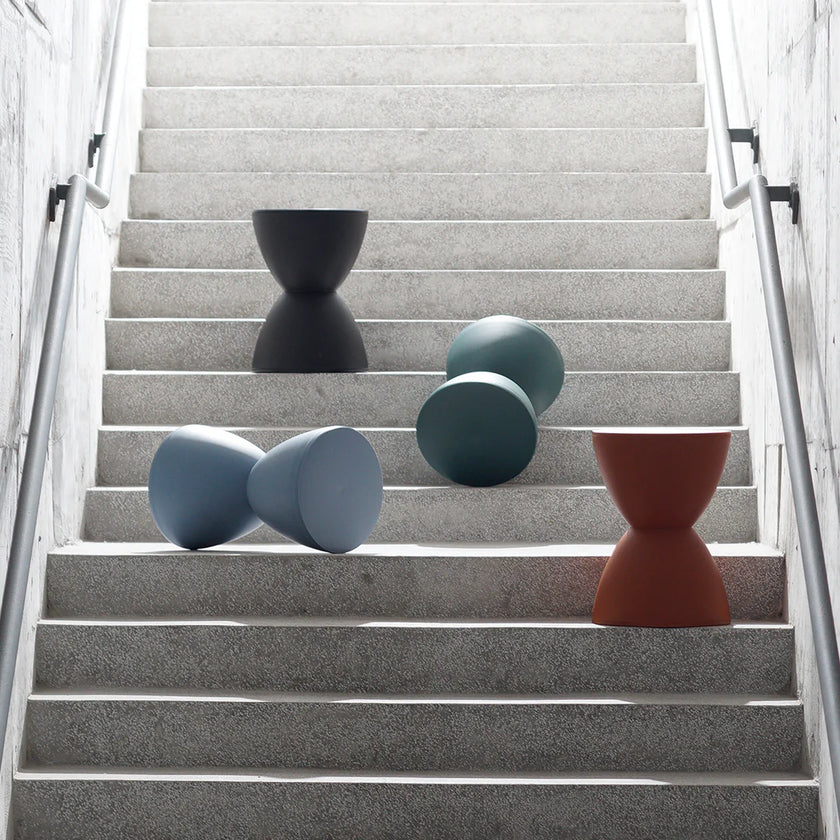 Colorful stools arranged on a staircase
