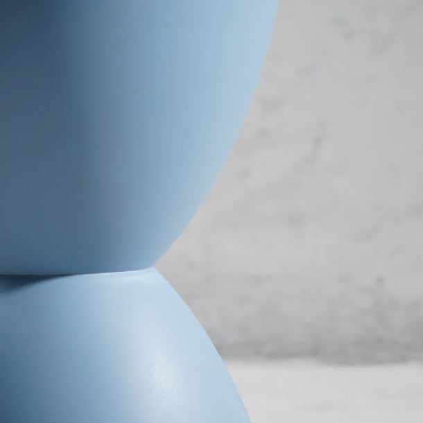 Close-up of a light blue and beige fabric texture