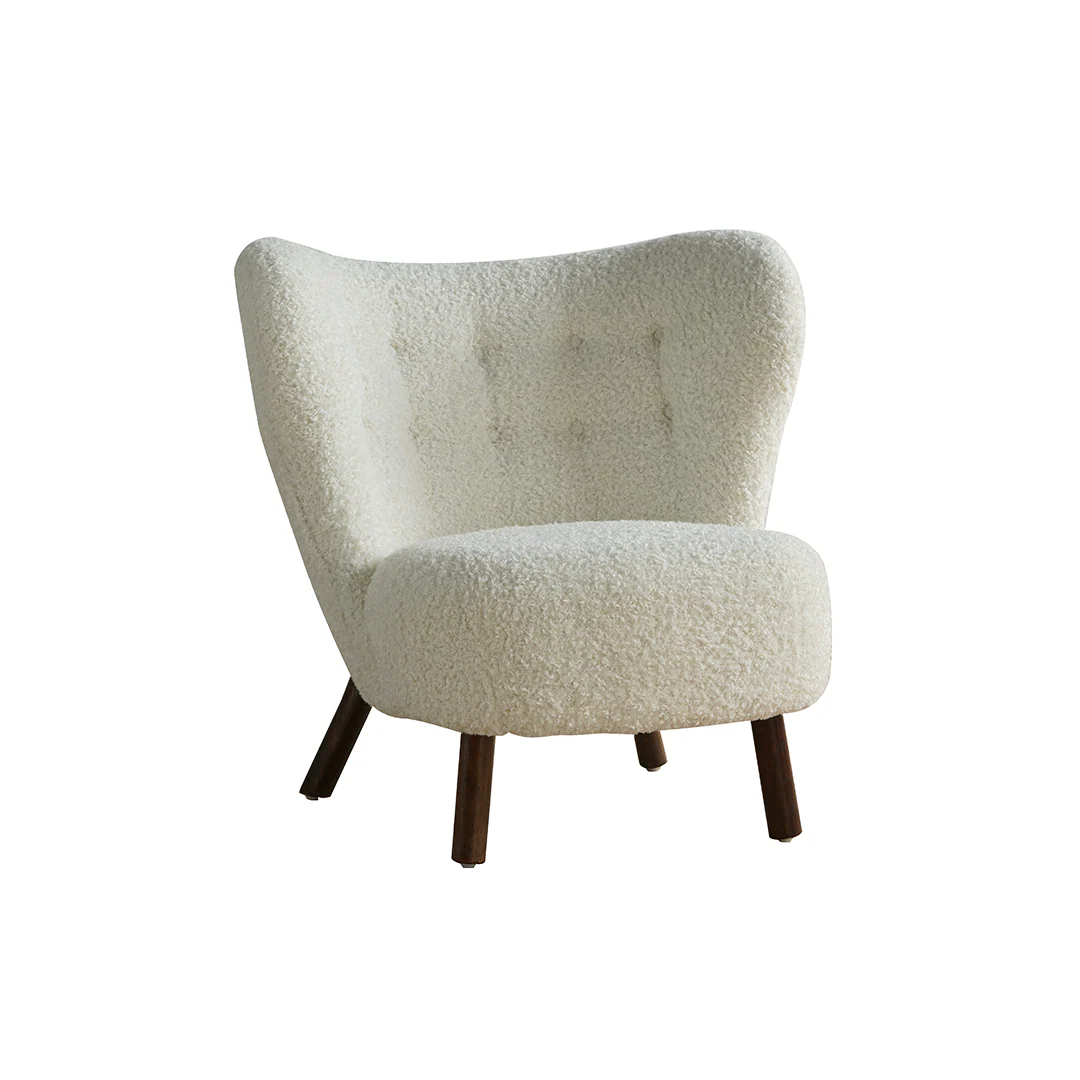 Beige armchair with wooden legs on a white background