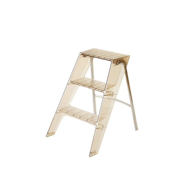 Clear plastic step stool on a white background