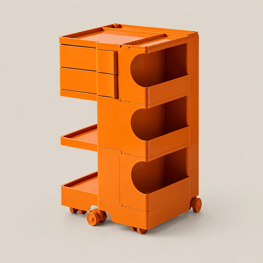 An orange rolling storage cart with three drawers, three pull-out trays, and open storage compartments, shown on a light beige background.