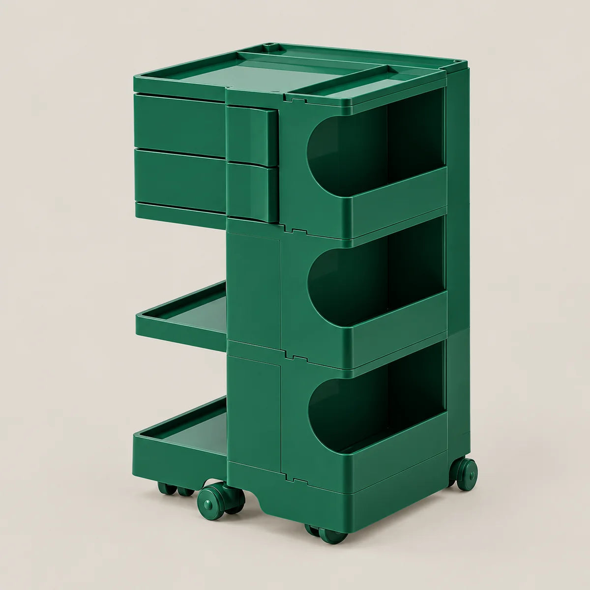 A dark green plastic rolling storage cart with three drawers, three open shelves, and caster wheels, shown on a solid light beige background.