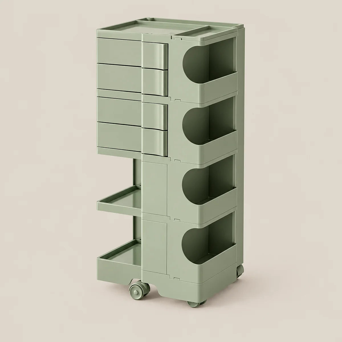 A sage green modular rolling storage cart with five tiers, featuring drawers on the upper level, open side shelves, and a lower pull-out tray, set against a solid light beige background.