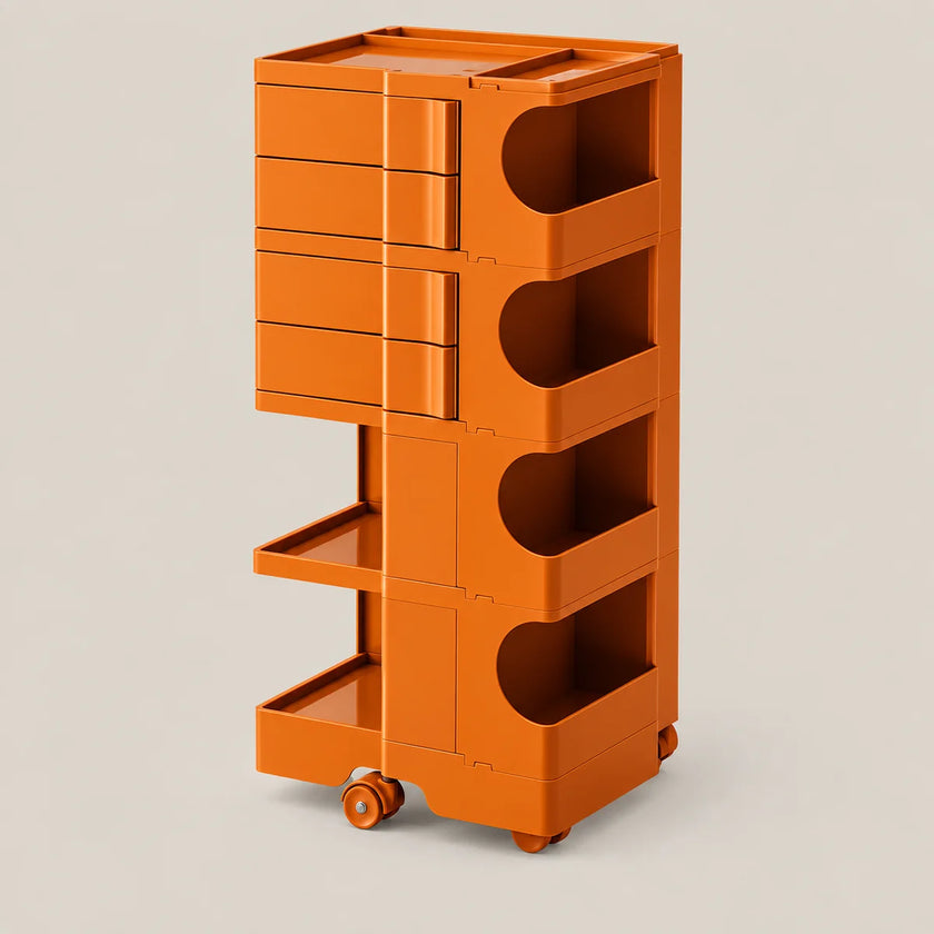 An orange modular rolling storage cart with multiple drawers, open shelves, and wheels, shown on a plain light beige studio background.