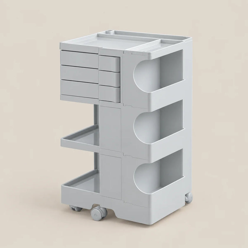 A light gray plastic rolling storage cart with three drawers on the left, two open shelves with curved cutouts on the right, and caster wheels at the base, shown on a plain beige background.
