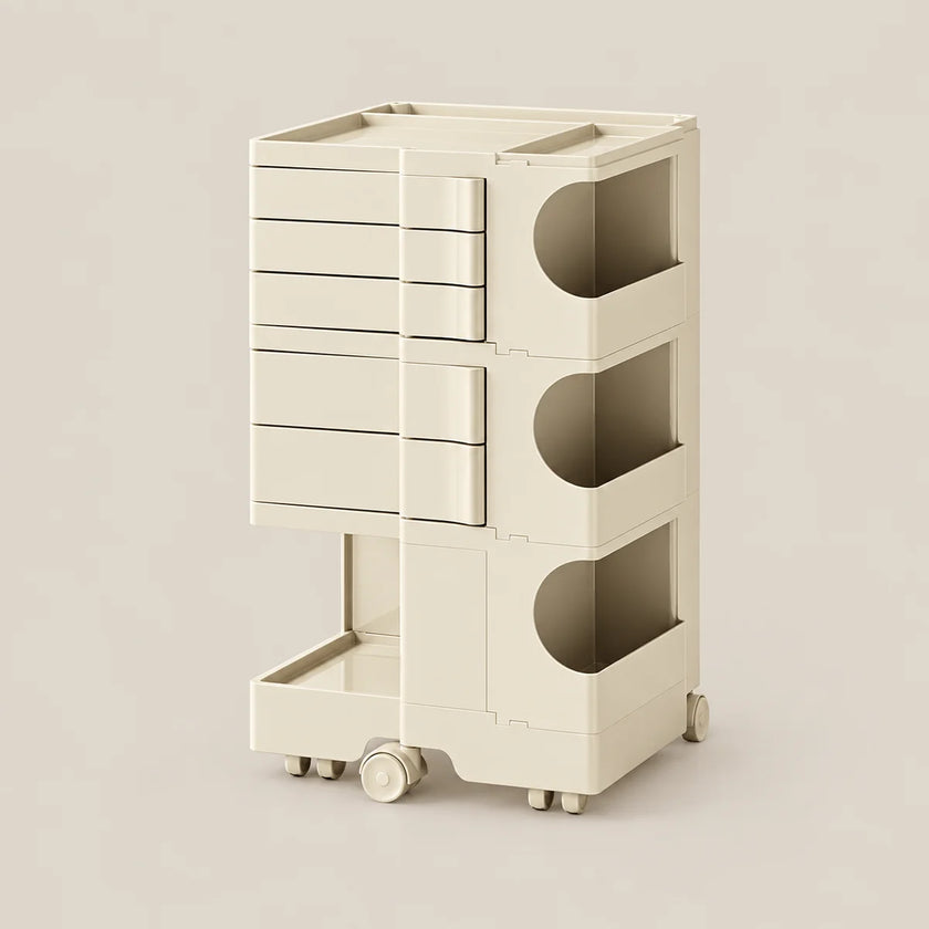 A cream-colored modular storage cart with multiple drawers and open cubbies, shown on a plain beige background.