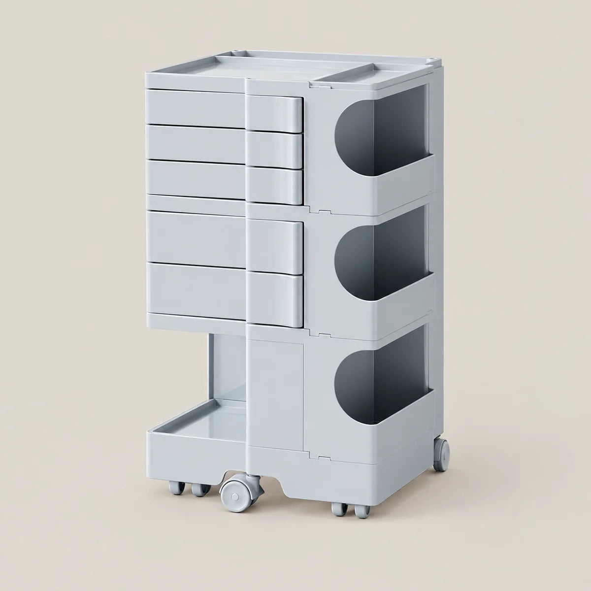 A light gray rolling storage cart with five drawers on the left, three open side compartments with semicircular cutouts on the right, and a lower pull-out tray, shown on a plain beige background.