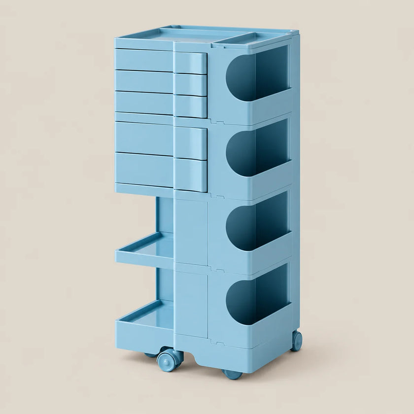 A light blue modular plastic storage cart with multiple drawers, open shelves, and wheels, shown on a solid beige background.